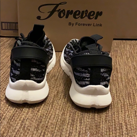 Fly knit breathable Sneakers in black and white - Picture 4 of 8